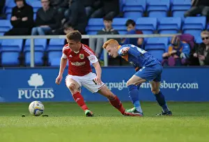 Shrewsbury Town V Bristol City Prints: Bristol City's Joe Bryan Outmaneuvers Shrewsbury Town's Ryan Woods during Sky Bet League One Match