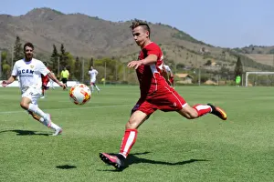 Friendly Prints: Bristol City's Joe Bryan Readies for Cross in Pre-Season Friendly Against UCAM