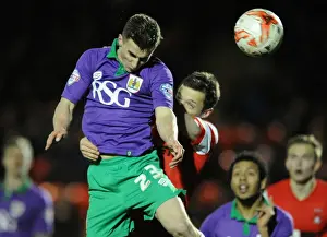 Leyton Orient V Bristol City Prints: Bristol City's Joe Bryan vs Leyton Orient's David Mooney: Intense Battle in Sky Bet League One Match