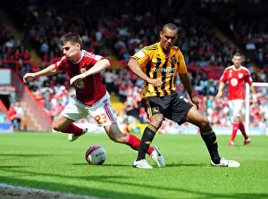 Bristol City's Joe Edwards Fights for Possession Against Hull City's Jay Simpson - Championship Clash