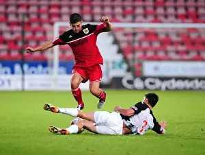 Pre Season Prints: Bristol City's Joe Edwards Tackled in Pre-Season Friendly Against Dunfermline Athletic