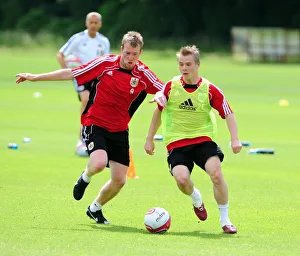 Bristol Citys Joe Lennox battles for the ball with Bristol Citys David Clarkson Bristol Citys Joe Lennox battles for the ball with Bristol Citys David Clarkson
