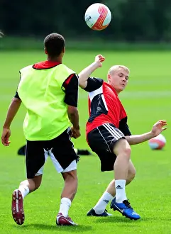 Pre-season Training Prints: Bristol Citys Joe Lennox battles for the ball with Bristol Citys Bobby Reid