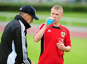 Bristol Citys Joe Lennox talks with Bristol City Manager, Steve Coppell