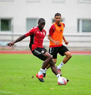 Training Prints: Bristol Citys John Akinde battles for the ball with Bristol Citys Liam Fontaine