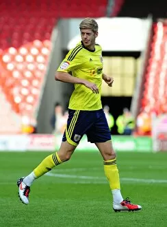 Images Dated 27th August 2011: Bristol City's Jon Stead in Action against Doncaster Rovers in League Cup Clash - 27/08/2011