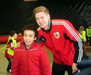 Framed Print : Bristol City's Jon Stead Engages with a Fan in the Community: Bristol City vs. Sheffield Wednesday, April 1, 2013
