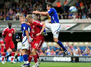 Bristol City's Jon Stead Fights for Aerial Ball Amidst Ipswich Defenders Tommy Smith and Luke Hyam, Championship Match, August 2010