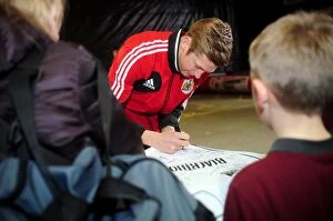 Images Dated 1st April 2013: Bristol City's Jon Stead Signs Shirt in Community Park During Bristol City V Sheffield Wednesday