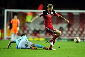 Bristol City V Hull City Prints: Bristol City's Jon Stead Slips Past Corry Evans of Hull City in Championship Clash