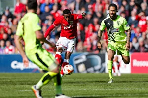 Images Dated 30th April 2016: Bristol City's Jonathan Kodjia Scores Thrilling Goal to Secure 3-0 Lead over Huddersfield Town