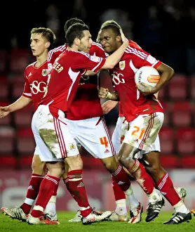 Bristol City V Leicester City Prints: Bristol City's Kalifa Cisse: Celebrating the Victory Over Leicester City at Ashton Gate Stadium (2012)
