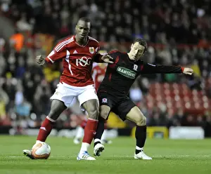 Bristol City V Middlesbrough Prints: Bristol City's Kalifa Cisse Fends Off Scott McDonald in Bristol City v Middlesbrough Match