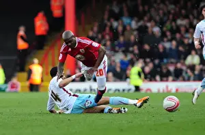 Framed Print : Bristol City's Kalifa Cisse Foul by Tyrone Mears during Championship Match, March 19, 2011