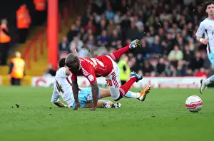 Bristol City V Burnley Prints: Bristol City's Kalifa Cisse Fouled by Tyrone Mears in Championship Match (2011)