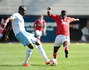 Title Prints: Bristol City's Kieran Agard Closes In on Coventry City's Reda Johnson - Intense Moment from the Pitch
