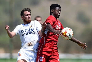 Images Dated 22nd July 2016: Bristol City's Kieran Agard Fights for Possession in Pre-season Friendly Against UCAM