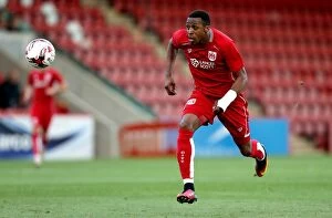 Images Dated 25th July 2016: Bristol City's Kodjia Chases Down the Ball in Preseason Clash against Cheltenham Town