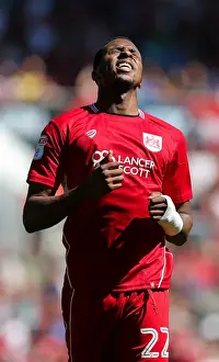 Opening Game Prints: Bristol City's Kodjia Displays Frustration Against Wigan Athletic