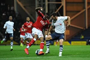 Images Dated 15th September 2015: Bristol City's Kodjia Spins Past Preston's Wright in Championship Clash