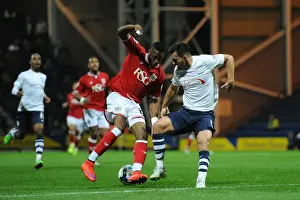 Framed Print : Bristol City's Kodjia Spins Past Preston's Wright in Championship Clash