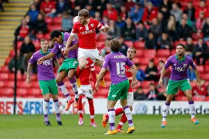 Barnsley V Bristol City Prints: Bristol City's Korey Smith and Barnsley's Sam Winnall Battle for Height in Sky Bet League 1 Clash