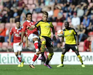 Bristol City V Colchester United Prints: Bristol City's Korey Smith Closes In on Colchester United's George Moncur in Intense Football Action