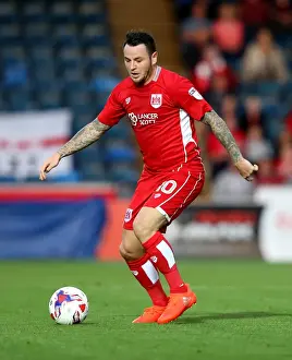 Framed Print : Bristol City's Lee Tomlin in Action against Wycombe Wanderers at Adams Park (09.08.16)