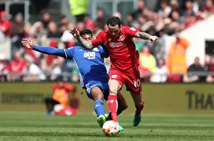 Bristol City V Birmingham City Prints: Bristol City's Lee Tomlin Dodges Birmingham's Davis in Championship Clash