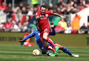 Bristol City V Birmingham City Prints: Bristol City's Lee Tomlin Evades Birmingham's Davis in Championship Clash