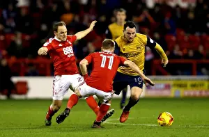 Nottingham Forest V Bristol City Prints: Bristol City's Lee Tomlin Faces Off Against Nottingham Forest's Ben Osborn in Championship Clash