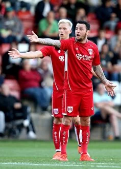 Images Dated 25th July 2016: Bristol City's Lee Tomlin and Hordur Magnusson Appeal for Penalty vs Cheltenham Town (25.07.2016)