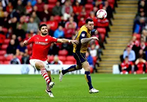Barnsley V Bristol City Prints: Bristol City's Lee Tomlin Outmuscles Barnsley's Sam Morsy for a Header at Oakwell Stadium