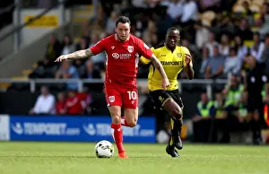 Bristol City's Lee Tomlin Outruns Burton Albion's Lucas Akins during Sky Bet Championship Match
