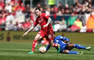 Images Dated 7th May 2017: Bristol City's Lee Tomlin Slips Past Birmingham's Davis in Championship Clash
