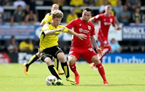 Bristol City's Lee Tomlin Tackled by Burton Albion's Matt Palmer during Sky Bet Championship Match
