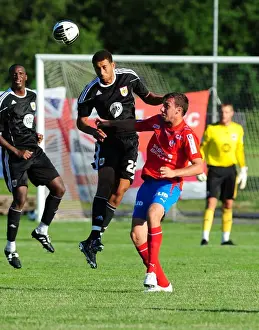 Bristol Citys Lewin Nyatanga challenges for the ariel ball