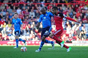 Bristol City V Leeds United Prints: Bristol City's Liam Fontaine Chases Down El-Hadji Diouf
