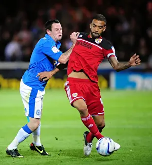 Bristol City's Liam Fontaine Fouls by Lee Tomlin in Peterborough United Championship Clash