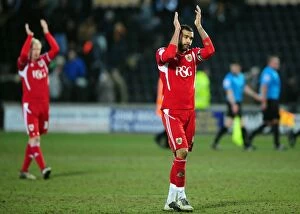 Images Dated 11th February 2012: Bristol City's Liam Fontaine Shows Appreciation to Traveling Fans at Hull City Championship Match