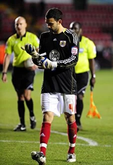 Images Dated 15th January 2011: Bristol City's Liam Fontaine Steps Up: Replacing David James in Goal After Red Card vs