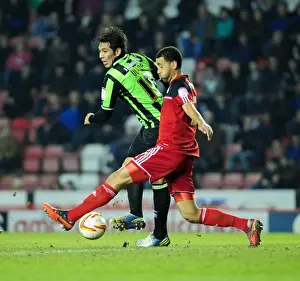 Bristol City V Brighton And Hove Albion Prints: Bristol City's Liam Fontaine Stops Leonardo Ulloa's Pass vs Brighton & Hove Albion