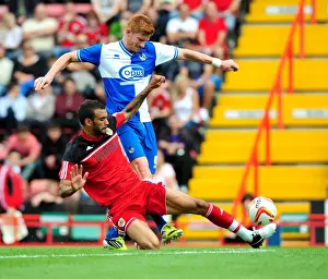 Bristol City's Liam Fontaine Tackles Matt Harold in Louis Carey's Testimonial Match vs