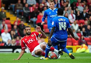 Bristol City V Birmingham City Prints: Bristol City's Liam Fontaine Tackles Morgaro Gomis in Championship Match vs Birmingham City - October 23