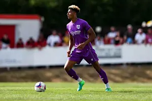 The Creek Prints: Bristol City's Lloyd Kelly in Action against Bristol Manor Farm