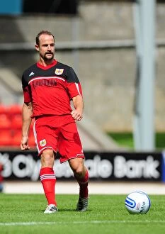 Images Dated 28th July 2012: Bristol City's Louis Carey in Action at McDiarmid Park during St Johnstone vs