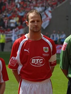 Play Off Final Collection: Bristol City's Louis Carey: Celebrating Promotion in the Play-Off Final