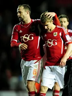 Images Dated 6th March 2012: Bristol City's Louis Carey Congratulates Joe Bryan on Debut Against Leicester City