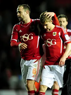 Bristol City V Leicester City Prints: Bristol City's Louis Carey Congratulates Joe Bryan on Debut Against Leicester City