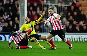 Southampton V Bristol City Prints: Bristol City's Louis Carey Fouled by Southampton's Guilherme do Prado during Championship Match